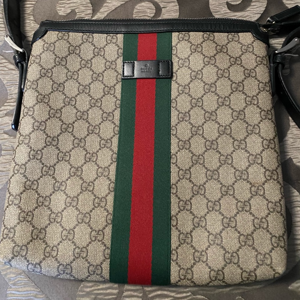 Slim messenger bag with Gucci Signature GG
